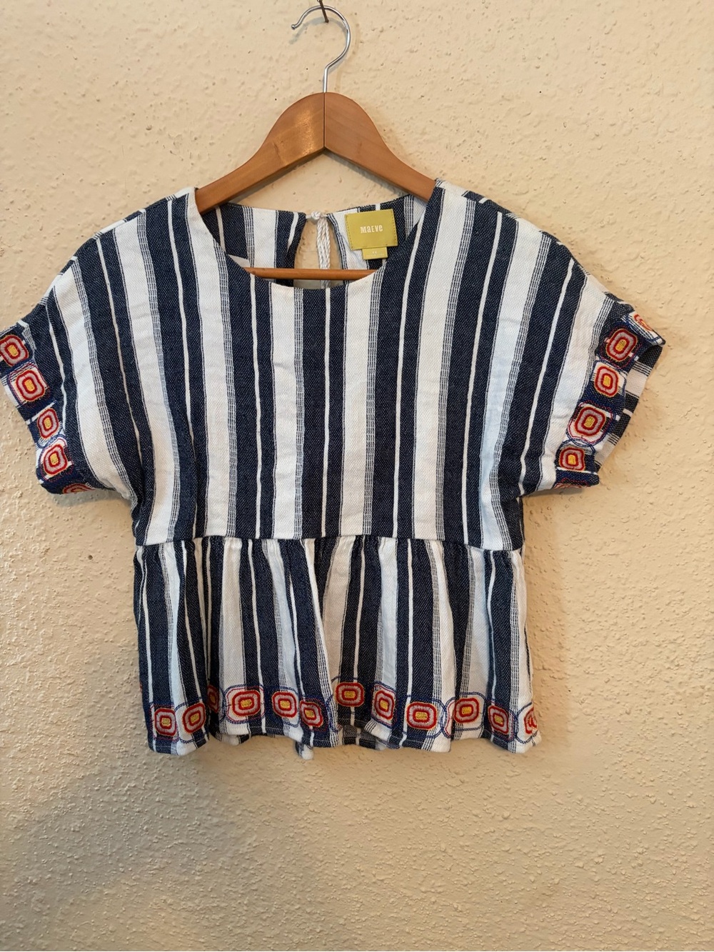Maeve Navy and White Striped Peplum Top with Colorful Embroidered Trim
